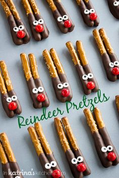 reindeer pretzels are arranged in rows on a table