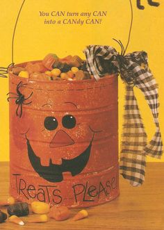 a trick or treat bucket with candy in it