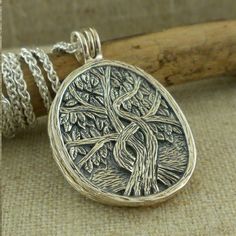 "Beautiful Sterling Silver Celtic Tree of Life Pendant Four alternative looks with the pendant \"Tree of Life with Spiral Background\" \"Tree of Life with Leaf Background\" \"Oxidized Tree\" or \"Spirals\" Pendant: 1.25\" long, 1\" with permanent bale. 22K Gold Gilding Thick 18\" Sterling Silver chain with lobster clasp. Nicely boxed with a silver cloth. This pendant comes standard with an 18\" Chain. Other lengths are available at no extra charge. Request 16\", 20\" or 22\" chain in the note se Unique Handmade Jewelry For Anniversary Gift, Spiral Jewelry With Intricate Design For Gift, Traditional Spiral Jewelry For Gifts, Hand Forged Spiral Jewelry Gift, Handmade Pendant Jewelry For Anniversary Gift, Nature-inspired Etched Jewelry For Gifts, Nature-inspired Etched Jewelry Gift, Unique Tree Of Life Jewelry Gift, Traditional Hand Forged Jewelry As Gift