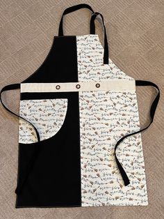 an apron with black and white designs on it