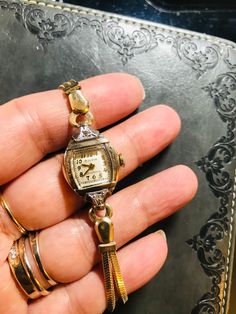 Year 1947(movement marked)  Bulova ~Excellency series A Fine Bulova Vintage Ladies watch (our ref M-29)   2 crown dainty real diamonds  21 rubies, (top precision movements of the time in 1947 & nowadays).  Perfect Dail !  14kGold 1/20 filled bracelet(rare new old stock )  &10K rolled gold case  Art Deco 1947 (movement hallmarked )  Oiled & Serviced - Winds and sets well and timekeeping Good(fit for daily wear like grandma  Signed Movement, dial , crown & case  Cosmetic condition: 98%new (minty )  Case size 20-22mm including winding button. Genuine antique- no rewrite of dail or mixed parts  Rare! Rare! Rare!  * For orders more than £500, ship by EMS/speedpost worldwide with no extra cost !  note : vintage watches / antique watches for more than 50 years ,  we will check before shipment for Bulova Watches Women, Vintage Bulova Watches, Wristwatch Vintage, Art Deco Watch, Bulova Watches, Vintage Watches Women, Old Watches, Antique Watches, Women Wrist Watch