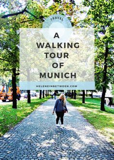 a woman walking down a cobblestone road with text overlay reading a walking tour of munich