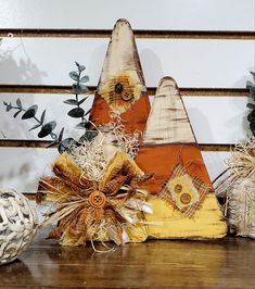 decorative items are arranged on a wooden table