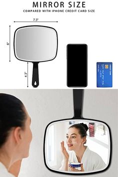 a woman is looking at her cell phone in the mirror while she brushes her teeth