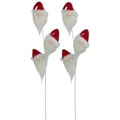 three santa claus heads on top of each other with long red hair and white beards