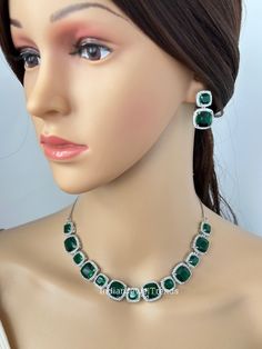 Emerald CZ diamond Necklace, Indian Pakistani wedding Jewelry, Mother of the Bride, Crystal Necklace, Bridesmaid, Gift for her  Gorgeous Emerald CZ Set in aaa quality CZ stones. This American Diamond Necklace Set comes with a pair of earrings. Necklace length 16 inches and shortened to 15 inches  Earrings Length approx 1 inch Regular size and adjustable Arrives in a gift box. Highest quality and craftsmanship Ready to ship from California, United States and delivery in 3-5 days in US Please let Elegant Green Rhinestone Necklace For Wedding, Silver Emerald Jewelry Sets For Wedding, Green Crystal Rhinestone Necklace For Wedding, Green Crystal Rhinestone Necklace For Formal Occasions, Dazzling Emerald Bridal Necklace For Wedding, Dazzling Emerald Jewelry For Wedding, Diamond White Emerald Wedding Jewelry, Dazzling Emerald Wedding Jewelry, Diamond White Emerald Necklace For Wedding