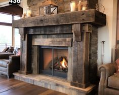 a living room filled with furniture and a fire place in the middle of a fireplace