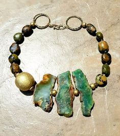 Tribal Bohemian Necklace Asymmetric Chrysoprase Turquoise African Trade Brass | eBay Asymmetric Necklace, Bohemian Chic Jewelry, African Beads Necklace, Artisan Jewelry Necklaces, Boho Chic Jewelry, Handcrafted Artisan Jewelry, Bohemian Necklace, Jewelry Design Necklace, Chic Jewelry