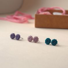 A mat ✨ set of small beaded earrings that can be worn every day. The set includes the following colors: - purple; - dusty pink; - dark green. The earrings are made of miniature Japanese beads. The metal base is stainless steel. The approximate diameter of one earring is 7-8 mm (0.27-0.31 in). A wonderful gift for any event to a wife, sister, friend💕 Please note❗️ The color rendering of the product may differ due to different settings of the displays. Small Beaded Earrings, Japanese Beads, Colors Purple, Pink Dark, Color Rendering, Round Stud Earrings, Seed Bead Earrings, Stud Earrings Set, Bead Earrings