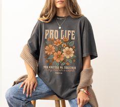 Celebrate your faith and values with our Pro Life Christian Shirt! Crafted from soft Comfort Colors ® fabric, this floral graphic tee beautifully showcases your commitment to Save the Babies. Perfect for everyday wear, it's designed for those who are unapologetically ProLife. Wear it proudly and inspire others to Choose Life! - Design is printed directly onto a unisex Comfort Colors Tshirt - 100% ring-spun cotton - Unisex - Relaxed fit (Please reference photos for size chart and comparison. We r Catholic Shirt, Bible Verse Tees, Praise The Lord, King Shirt, Floral Graphic, Retro Tee, Christian Tees, Christian Apparel, Christian Shirt