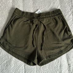 Brand H&M Color Army Green Size Small Condition Nwt Material Is Thick Like Sweatpants. Has Two Pockets. Length Is Short And Has Drawstrings H&m Short Bottoms With Elastic Waistband, H&m Elastic Waistband Short Bottoms, H&m Cotton Stretch Bottoms, H&m Stretch Cotton Bottoms, H&m Casual Bottoms With Elastic Waistband, H&m Shorts With Elastic Waistband, H&m Casual Shorts With Elastic Waistband, H&m Shorts For Summer Loungewear, Casual H&m Bottoms With Elastic Waistband