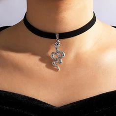 Get ready to slay with these stunning handmade Retro Gothic Black Velvet Choker Snake Pendant Necklaces.  🐍🖤 #EtsyShop #Choker #Chokers #ChokerNecklace #handcraftedJewelry #Handcrafted #Handmade #Snake #JewelryBusiness #JewelryForSale #JewelryGifts #JewelrySale #instajewelry #JewelryOfInstagram #JewelryStore #HandmadeJewelry #HandmadeGifts #HandmadeJewellry #Necklace #Necklaces #NecklaceOfTheDay #HandmadeNecklace #StatementNecklace #ShopHandmade #Jewelry #HandmadeAccessories Necklace Snake, Black Velvet Choker, Necklace Trendy, Snake Pendant, Snake Jewelry, Velvet Choker, Jewelry Picture, Kundan Necklaces, Choker Style