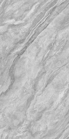 a white marble textured surface with grey streaks