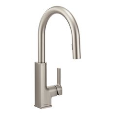 the kitchen faucet is shown in brushed stainless steel, and features a pull - down