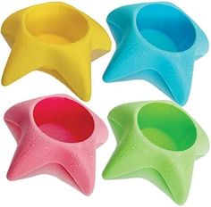 four star shaped dishes in different colors