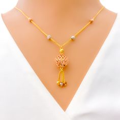 Embrace a blend of opulence and craftsmanship with this 22k gold necklace. Weighing in at 8.8 grams, its intricate netted design is brought to life by a harmonious blend of yellow, rose, and white gold finishes. The necklace, extending to an 18" length, features a delicate drop of 1.25". Securely fastened with a lobster lock, this piece promises to be a timeless addition to your collection. PRODUCT DETAILS Gold Purity(karat): 22k Gold Weight(grams): 8.8﻿ Item Finish: Yellow + Rose + White Gold N 22k Gold Necklace, Gold N, 22k Gold, Yellow Roses, Yellow Rose, Gold Finish, Gold Necklace, White Gold, Rose Gold