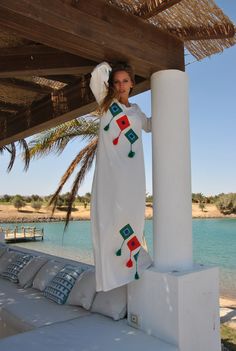 A stunning embroidered Kaftan dress that is elegant, colorful, and unique! The dress is made of Egyptian cotton that has a soft feel to it so you will surely feel comfortable and royal in it.  -----------Medium------------ Bust : 39-40 Hip : 45-46  -----------Large---------------- Bust : 44-45 Hip : 50-51  -----------X-Large-------------- Bust : 47-48 Hip : 53-54  -----------XX-Large-------------- Bust : 49-50 Hip : 55-56 Length : 57 inches (145cm) Composition : 70% Egyptian Cotton; 30% Polyeste Caftan Dress Kaftan, Embroidered Caftan, Embroidered Kaftan, Cotton Caftan, Dress Kaftan, Kaftan Maxi Dress, Caftan Dress, Kaftan Dress, Egyptian Cotton