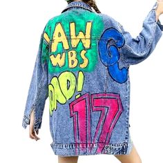 Make a bold statement with our Painted Graffiti Print Denim Jacket from the 2023 Autumn-Winter Collection! This Y2K-inspired piece is designed to be lengthy and oversized. with a unique graffiti print and buttoned closure. making it the perfect addition to any wardrobe.Distinctive Features: Y2K Style: This jacket is designed with a Y2K-inspired style. featuring an oversized fit and a unique graffiti print. Painted Graffiti Print: The jacket features a one-of-a-kind painted graffiti print. a mode Spring Denim Outerwear With Graphic Print, Casual Blue Outerwear With Graffiti Print, Trendy Spring Outerwear With Graffiti Print, Trendy Oversized Multicolor Outerwear, Blue Letter Print Outerwear, Oversized Trendy Outerwear With Graphic Print, Trendy Oversized Outerwear With Graphic Print, Trendy Denim Jacket With Graphic Print For Fall, Oversized Blue Denim Jacket For Streetwear