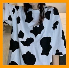 This unique and eye-catching cow print t-shirt is perfect for anyone who loves animals, especially cows! The design features a hand-painted cow print that is sure to make a statement. Made from soft and comfortable material, this t-shirt is perfect for everyday wear. Whether you're running errands or out for a casual day with friends, you'll love showing off your love for cows in style. This cow print t-shirt is perfect for animal lovers, cow enthusiasts, and anyone looking for a unique and fun t-shirt to add to their wardrobe. Casual Cow Print T-shirt For Summer, Casual Short Sleeve Cow Print Tops, Casual Cotton T-shirt With Cow Print, White Casual T-shirt With Cow Print, White Cow Print Crew Neck T-shirt, White Cow Print Top For Summer, Short Sleeve Cotton Tops With Cow Print, Spring Cow Print Short Sleeve Top, Summer Cow Print Crew Neck T-shirt