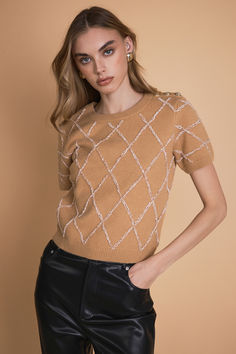 Introducing our latest addition to our collection of stylish sweaters and knits - the Diamond Pattern Knit. Made from a soft and cozy knit fabric, this top features a classic round neckline and flattering short sleeves. Stand out from the crowd with the eye-catching diamond pattern that adds a touch of sophistication to any outfit. Our Diamond Pattern Knit is perfect for transitioning from day to night, keeping you both warm and stylish. Knitwear Trends, Jumpsuit Fall, Knit Loungewear, Strapless Bodycon Dress, Stylish Sweaters, Tweed Dress, Blazer And Shorts, Cozy Knit, Geek Chic