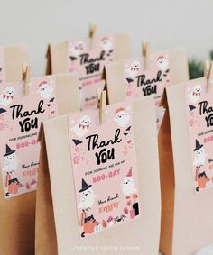 small bags with thank you tags attached to them