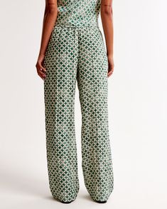 Elevate your wardrobe with the Abercrombie & Fitch Women's Crinkle Textured Pull-On Pants, a perfect blend of comfort and chic style. These ultra high-rise, wide-leg pants are crafted in a breezy, crinkle-textured fabric that adds a touch of sophistication to your everyday look.

- Size: XL
- Color: Green Pattern
- Material: Body: Polyester, Nylon
- Gender: Female
- Features: Elasticated waistband, functional pockets

Ideal for both office wear and casual outings, these pants promise versatility Female Features, Pants Green, Women's Bottoms, Green Pattern, Textured Fabric, Pull On Pants, Office Wear, Smart Casual, Everyday Look