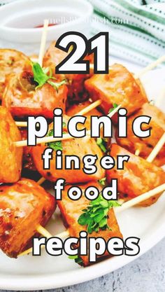 some food is on a white plate with the words 21 picnic finger food recipes over it