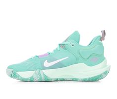 the nike zoom basketball shoe in light blue and white, with pink accents on the upper part