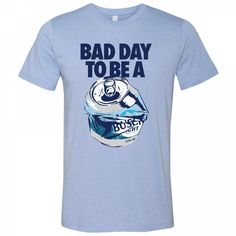 Busch Light Bad Day Blue Colorway T-Shirt Officially licensed Busch Light Bad Day Blue Colorway T-Shirt. Made from cotton, this "Busch Light" blue colorway t-shirt features a "Bad Day To Be A" design on the front. Most orders ship within 1 business day Returns accepted within 30 days Mens Size Chart The actual in-stock sizes for this item can be chosen from the menu near the Buy It Now button on the top. This chart displays the general sizing for our line of products. Sizes may vary slightly bet Beer Drawing, Busch Light, Pong Table, Beer Pong, T Shirt Image, Light Beer, Eco Friendly Fashion, Bad Day, A Design