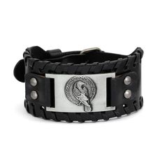 PRICES MAY VARY. VIKING WRISTBAND FOR MEN: This superb Norse leather bracelet fuels your masculinity with all Viking vibes, featuring the raven of Odin design embossed on the metal talisman EXCELLENT QUALITY: The bracelet is made of genuine leather which offers comfortable experience while the metal talisman is meticulously crafted from top-grade zinc alloy with an antique silver finish SPECIFICATIONS: The bracelet measures 10.63 inches (27 cm) in length and 1.42 (3.6 cm) inches in width, comes Adjustable Gothic Leather Bracelet Gift, Gothic Adjustable Leather Bracelet, Medieval Style Adjustable Leather Bracelet Gift, Medieval Style Adjustable Leather Bracelet For Gift, Adjustable Medieval Leather Bracelet Gift, Adjustable Gothic Leather Wristband, Adjustable Leather Gothic Wristband, Vintage Black Leather Bracelet, Adjustable Black Viking Bracelet