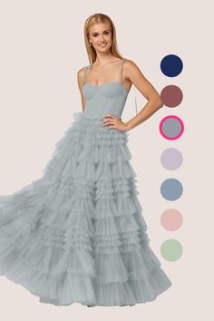 This floor length dress features a sweetheart corseted bodice, bow tie straps, and a tulle tier ball gown skirt. Grey Bridesmaid Dress, Gown Skirt, Grey Bridesmaid Dresses, Chiffon Bridesmaid Dresses, Floor Length Dress, Ball Gown Skirt, Floor Length Dresses, Chiffon Bridesmaid, Ball Gown