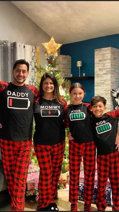 the family is dressed up in matching pajamas for their christmas day party, and they are ready to kick off the holiday spirit