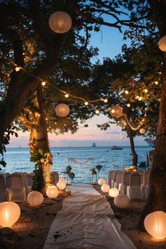 Create an elegant beach wedding with simple and rustic decor ideas. Our themes include boho and Indian inspirations, featuring seashells and surf elements in the table decorations to enhance your reception's natural beauty. Bohemian Beach Wedding Ideas, Beach Wedding Evening, Wedding Decorations Beach Theme, Romantic Beach Wedding Ideas, Bohemian Theme Wedding Decor, Beach Decor For Wedding, Beach Wedding Celebration, Wedding Near Beach, Wedding Beach Ideas Decoration