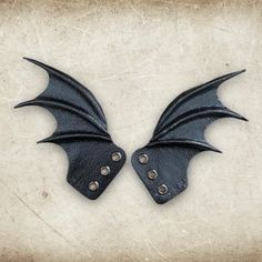 IMPORTANT NEWS!!  Due to the UK leaving the EU, postage prices have increased but have kept them as low as I can for my customers. Black collection of leather wings, bat/dragon shaped wing. Alternative fashion accessories for someone who likes something different, unique and unusual gift. Metallic black finish. Perfect for your Halloween costume or a Halloween gift. Bat Fashion, Bat Dragon, Roller Skate Accessories, Shoe Wings, Leather Wings, Skate Accessories, Costume Wings, Clay Dragon, Black Shoe