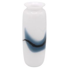 a white and black vase sitting on top of a table