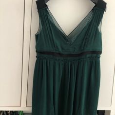 An Emerald/ Bottled Green Silk Chiffon Size 44 Miu Miu Dress But It’s More Like A 42 . Bust Size 34. Green Empire Waist Evening Dresses, Chic Silk Empire Waist Dress, Chic Silk Dress With Empire Waist, Chic Empire Waist Cocktail Dress, Chic Cocktail Dress With Empire Waist, Lined V-neck Mini Evening Dress, Green Empire Waist Dress For Formal Occasion, Green Empire Waist Dress For Formal Events, Chic Sleeveless Miu Miu Dress