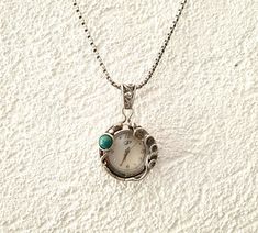 "From PORANS collection ---> 925 sterling silver delicate round pendant watch necklace with turquoise stone for women gift. Pendant watch dimensions: Length:38 mm Max width:24 mm The length of the chain is usually 24\" - 26\" yet can be made at any size you wish, if you are interested in a specific length, Please! write a note on check out Our watch is top quality stainless still, analog, Japanese movement with water resistance (up to 3 atmospheres) and it is powered by a battery that lasts a Elegant Silver Turquoise Necklace With Round Pendant, Elegant Nickel-free Round Turquoise Necklace, Elegant Round Turquoise Nickel-free Necklace, Elegant Round Silver Turquoise Necklace, Engraved Cuff, Pendant Watch, Freshwater Pearl Ring, Pendant Watches, Silver Chain Necklace