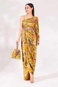 Mustard pleated padded dress with floral print and embellished with cutdana, sequins and beads embroidery. Comes with matching bag. - Aza Fashions Designer Floral Print Party Dress, Fitted Multicolor Party Wear Dress, Multicolor Fitted Party Wear Dress, Fitted Multicolor Dress For Party Wear, Designer Fitted Dress For Reception, Designer Fitted Reception Dress, Summer Party Wear Georgette Dresses, Silk Draped Party Wear Dress, Silk Draped Dress For Party Wear