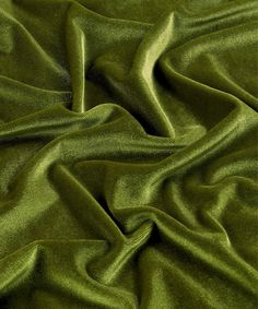 the green fabric is very soft and shiny