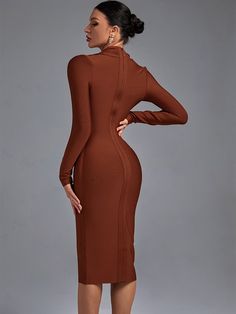 The Women Long Sleeve Bandage Dress is a stunning and versatile dress that is perfect for any occasion. Made from high-quality bandage material, this dress is designed to hug and flatter your curves, while also providing maximum comfort and flexibility. With its long sleeves, this dress is perfect for cooler weather, making it a great option for fall or winter events. The bandage material is also stretchy, allowing you to move with ease and confidence, whether you're dancing the night away or mingling with friends. The Women Long Sleeve Bandage Dress features a form-fitting silhouette that accentuates your curves and highlights your best features. The long sleeves provide coverage, while the short hemline adds a touch of sexiness and sophistication. The dress is available in a range of col Stretch Dresses With Side Zipper For Fall, Fitted Midi Dress With Invisible Zipper, Stretch Midi Bodycon Dress With Back Zipper, Stretch Midi Dress With Back Zipper, Fitted Long Sleeve Dress With Zipper Closure, Elegant Long Sleeve Bodycon Dress With Zipper, Bodycon Dress With Back Zipper For Fall, Elegant Long Sleeve Bodycon Dress With Zipper Closure, Fitted Bodycon Dress With Zipper Closure For Club