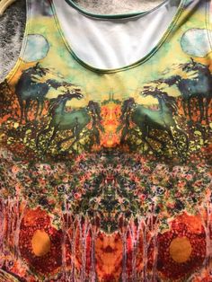 "Featuring my original batik Horses in the Moon, this equine inspired item of clothing is a comfortable fit and very stylish! Order a body hugging fitted tank top or a relaxed loose fitted one! Choose from regular (21.5\"-22.5\") or long fit (24\"-25\"). Pictured in regular fit. Choose the length you like! At this time only a large regular fitted tank is available. Choose a size up if you are in doubt! L (12-14) for 40\" bust, 31\" waist, 42\" hips * Custom made just for you, printed and sewn by Casual Sleeveless Top With Abstract Print, Fitted Bohemian Tops With Batik Print, Fitted Bohemian Batik Print Top, Printed Tank Top For Spring Festival, Spring Festival Tank Top With Graphic Print, Summer Festival Tops With Sublimation Print, Artsy Printed Summer Tops, Artsy Printed Tops For Summer, Artsy Sublimation Print Tops For Summer