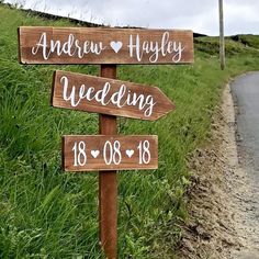 a wooden sign on the side of a road that says, and now happily wedding