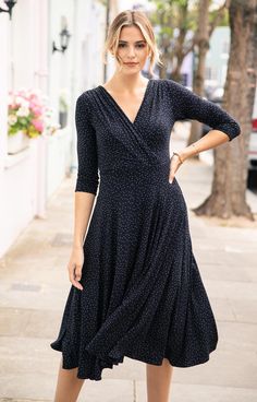 Enjoy effortless style in this latest new colourway of our bestselling Annie. Featuring a polka dot design in light taupe, scattered over a dramatic dark navy ground. Designed for a flattering fit with a nipped in waist and fit-and-flare skirt. The 3/4 length sleeves and gathered cross-over neckline are details you will love. Wear with comfy trainers for street-style chic or with heels for a glam day-to-dinner look. Polka dot print 3/4 length sleeves Crossover V-neckline Fit-and-flare silhouette Comfy Trainers, Annie Dress, Tiffany Rose, Fit And Flare Skirt, Night Style, Japanese Dress, Polka Dot Design, Polka Dress, Dot Design