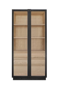 an empty bookcase with glass doors on the front and bottom shelves in black frame