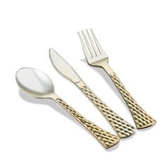 three forks and two spoons on a white surface