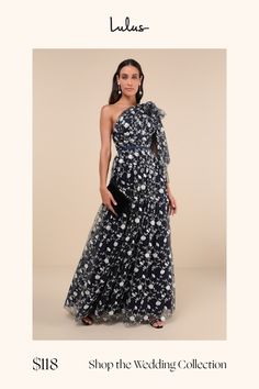 a woman in a dress with flowers on it and the words shop the wedding collection