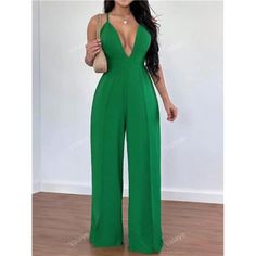 Unleash Your Inner Diva With This Striking Green Backless Jumpsuit. Designed For A Sexy And Sophisticated Look, It Features A Spaghetti Strap Neckline And A High Waistline That Highlights Your Curves. The Backless Design, Knot Detail, And Zipper Add A Touch Of Allure, Making This Jumpsuit Perfect For Making A Bold Statement. Crafted From Woven Fabric, This Long, Sleeveless Jumpsuit Offers A Loose Fit With A Non-Stretch Finish For A Relaxed, Flowing Silhouette. Practical Pockets And An Unlined Bo Backless Solid Color Jumpsuits And Rompers For Spring, Spring Backless Solid Color Jumpsuit/romper, Spring Solid Color Backless Jumpsuits And Rompers, Spring Evening Jumpsuits And Rompers With Spaghetti Straps, Spring Evening Jumpsuit With Spaghetti Straps, Fitted Green Halter Neck Jumpsuit, Elegant Jumpsuits And Rompers With Spaghetti Straps For Beach, Elegant Solid Strapless Jumpsuit For Beach, Elegant Beach Jumpsuit With Spaghetti Straps