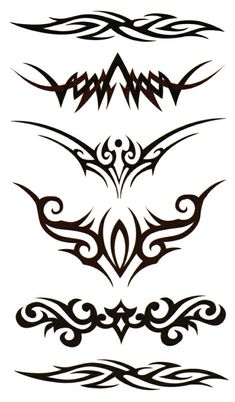 an image of tattoos on the back of a sheet of white paper with brown and black designs