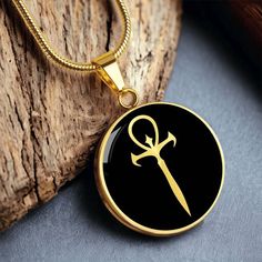 This Vampire Ankh necklace Is the Perfect Gift Whether for Yourself or a Loved One.  Explore all our Demon sigil seal jewelry here: https://www.etsy.com/in-en/shop/SymbolicPresent?ref=seller-platform-mcnav§ion_id=23148426 ➜ Our jewelry is made of high-quality surgical steel with a shatterproof liquid glass coating and an 18k gold finish option. ➜ Engrave onto the back of the Vampire Ankh pendant your loved one's name, your wedding date, an anniversary, or anything else you want to remember and k Gothic Gold Pendant Necklace, Gothic Gold Stainless Steel Jewelry, Gothic Gold Necklace With Adjustable Chain, Gold Gothic Engraved Necklace, Gothic Gold Necklace For Gift, Gold Gothic Necklace For Gift, Gothic Ankh Jewelry For Gift, Gothic Gold Engraved Jewelry, Gothic Medallion Jewelry For Gifts