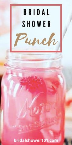 a mason jar filled with pink liquid and the words bridal shower punch on it